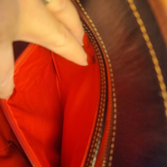 Dooney & Bourke Saffiano Tassel Bucket Tote Bag in black with tan trim - Picture 13 of 16